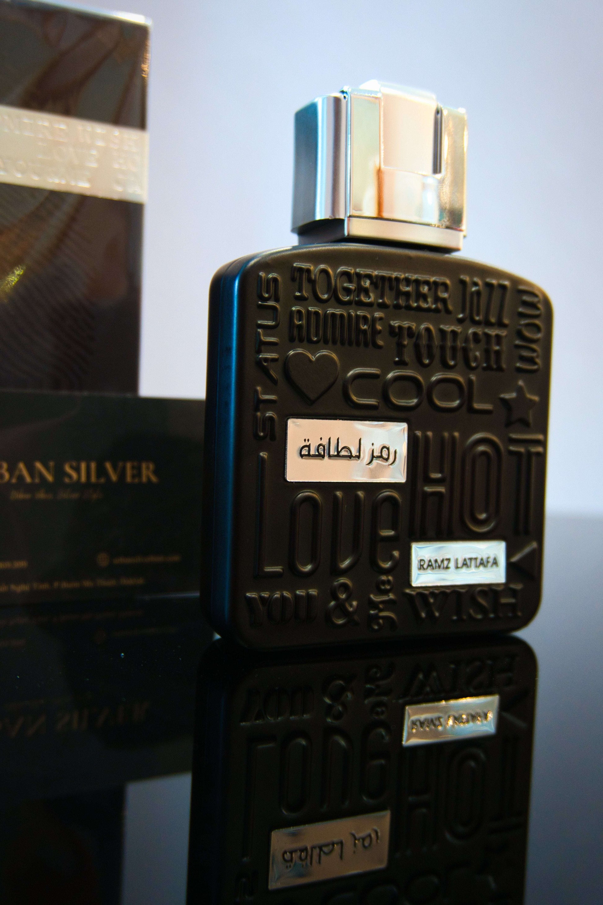 Hộp và chai nước hoa Lattafa Ramz Silver 100ml chính hãng tại Urban Silver